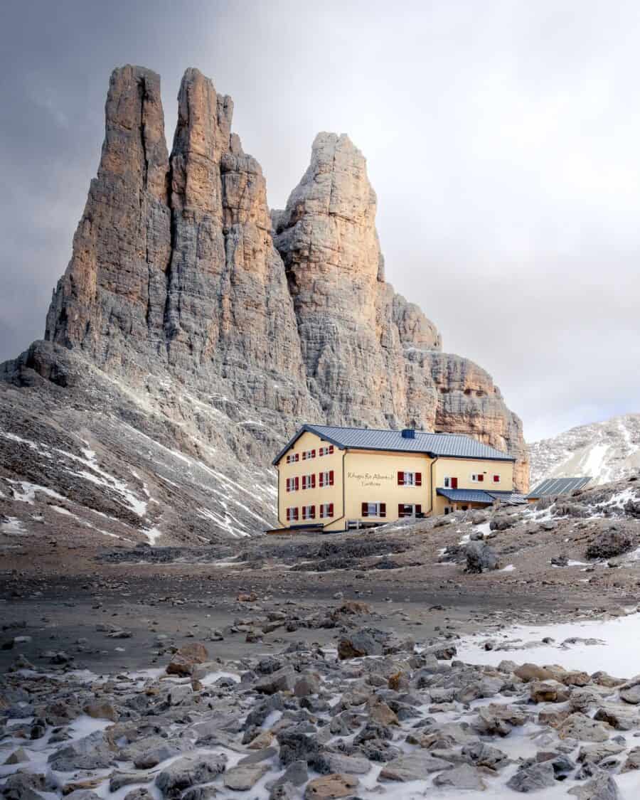 does it snow in Italy Yellow and Brown Concrete House Near Rocky Mountain