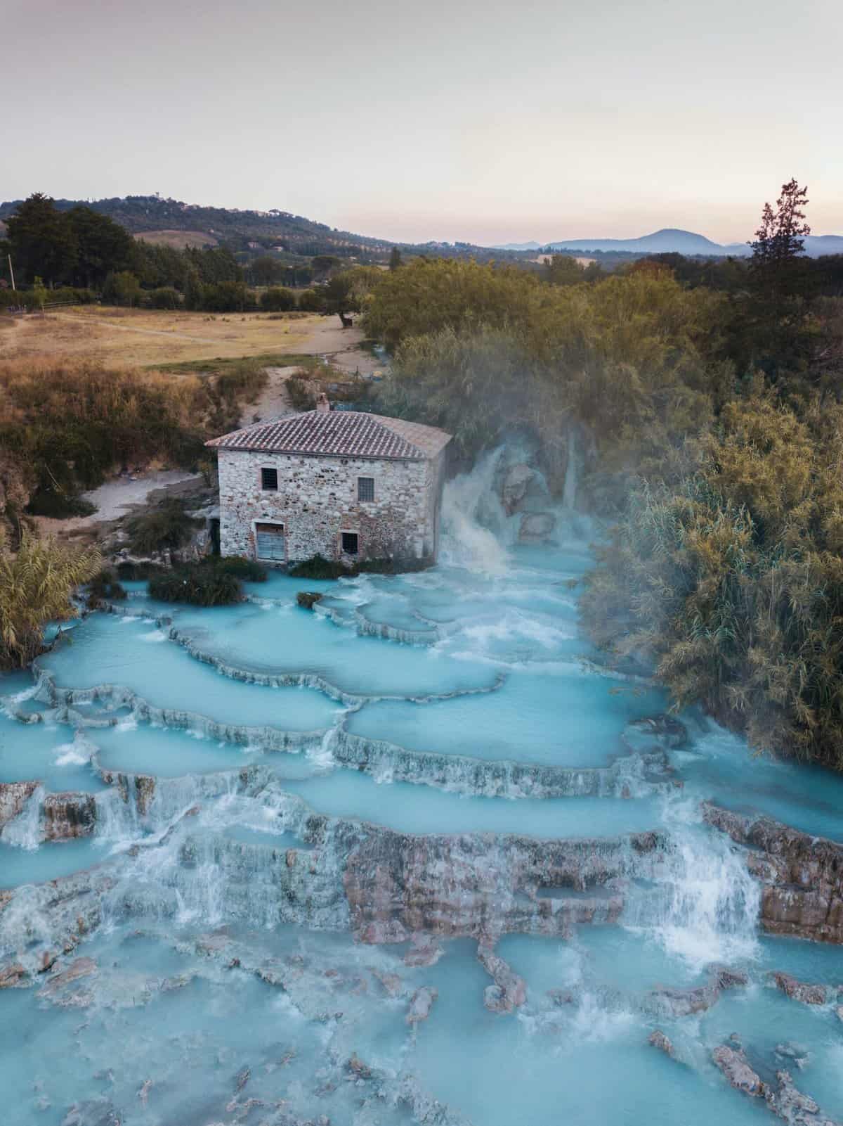 Coco Tran — Aesthetic Travel Blog By Film Photographer Coco Tran https://cocotran.com/visiting-hot-springs-tuscany-saturnia-italy/