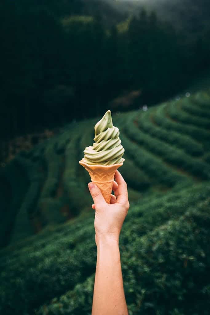 Photo of Person Holding Ice Cream Cone